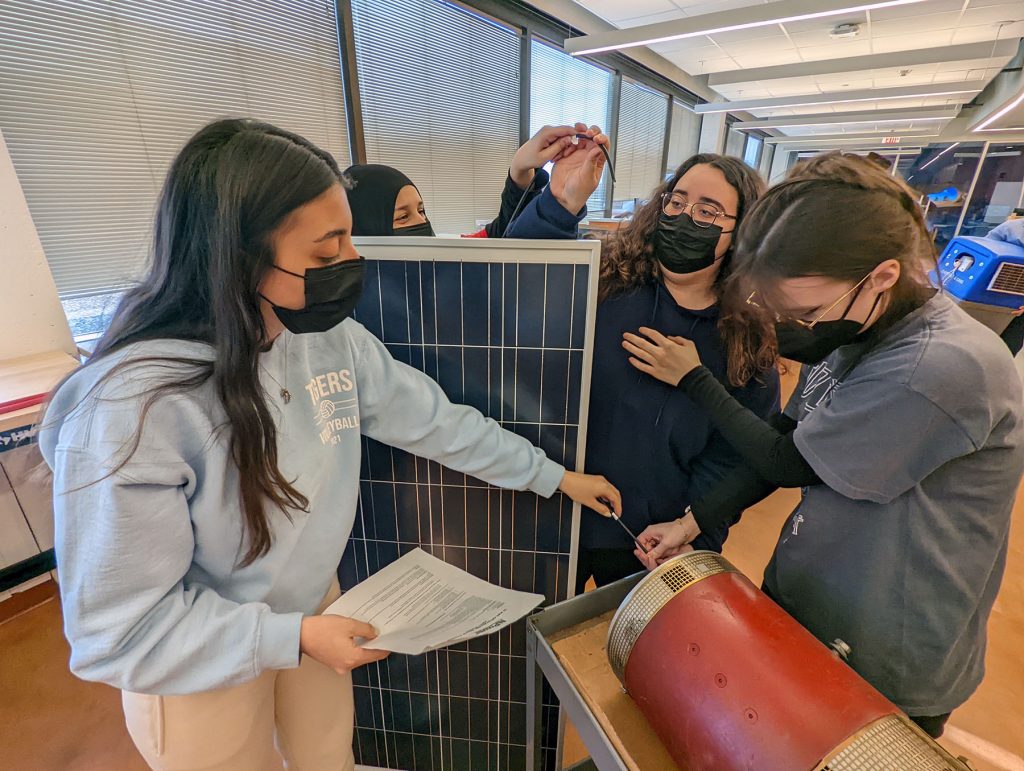 Bergen STEM students working on a solar energy project.