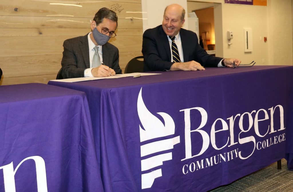Bergen Community College President Eric M. Friedman, Ph.D., and Pace University President Marvin Krislov.